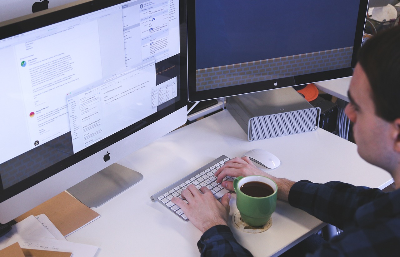 A man sitting in front of computer