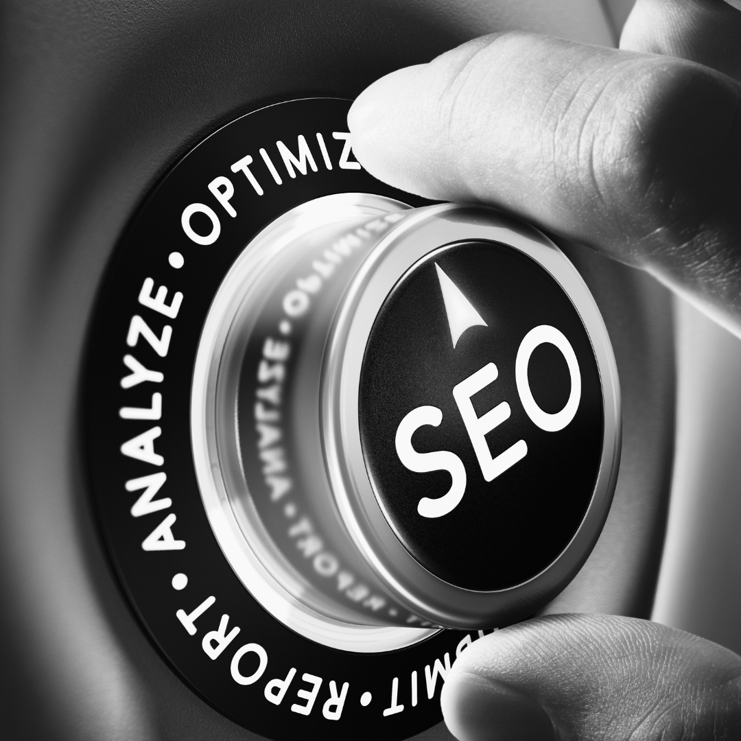 a hand moving a volume writeen seo on it